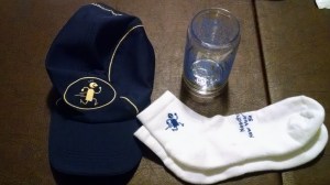 Cap, socks, and beer glass.