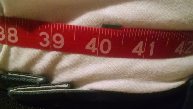 Measuring tape shoing 40 inches around the waist.